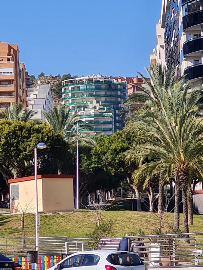 Elegant 2-Bedroom Apartment In Benidorm With Private Pool And Scenic Garden Views カーラ・デ・フィネストラット エクステリア 写真